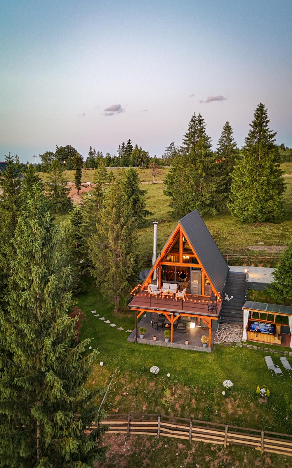 Cabin nestled in Apuseni Mountains landscape